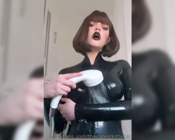 Misty silver aka Thecutestkittycat OnlyFans - Zipping up a vibrator inside me and my latex catsuit whilst I wash 2