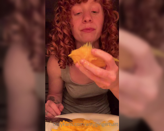 Amy Hart aka Amygingerhart OnlyFans - Eating a mango at midnight