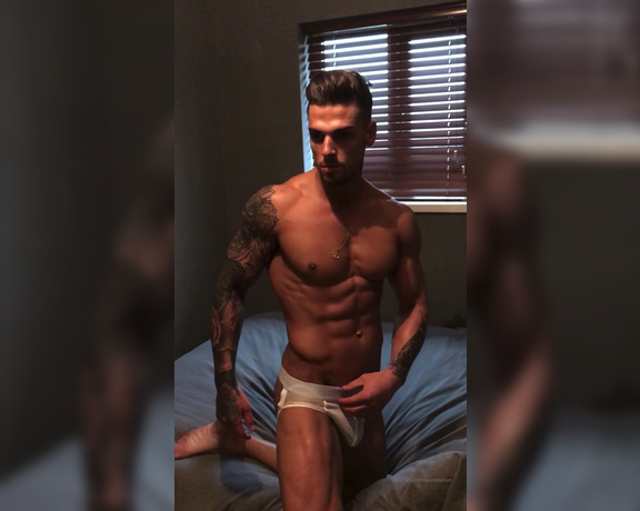 Pump Action aka Pumpaction OnlyFans - Behind the scenes shoot of @juicyjayuk posing in bedroom in a jockstrap