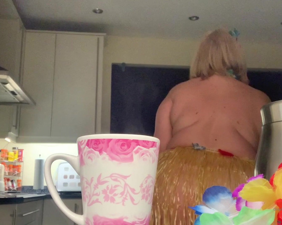 Catherinecan1 aka Catherinecan1 OnlyFans - Coffee Time plus a little more! Watch as my grass skirt wiggles and my flower garlands fall