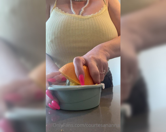 Courtesan Annabel aka Courtesananna OnlyFans - Squeezing oranges with thin strappy top, nipples showing shout out to the gent who suggested this