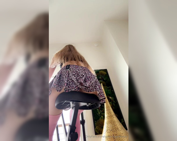 Pyra Fae aka Ursecretgirlfriend OnlyFans - Letting you peek up my skirt while I ride my new exercise bike in front of my window 2
