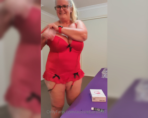 AussieBarbie07 aka Aussiebarbie07 OnlyFans - Opening and trying on another gorgeous red bustier outfit bought by a fan Ill get some more pics