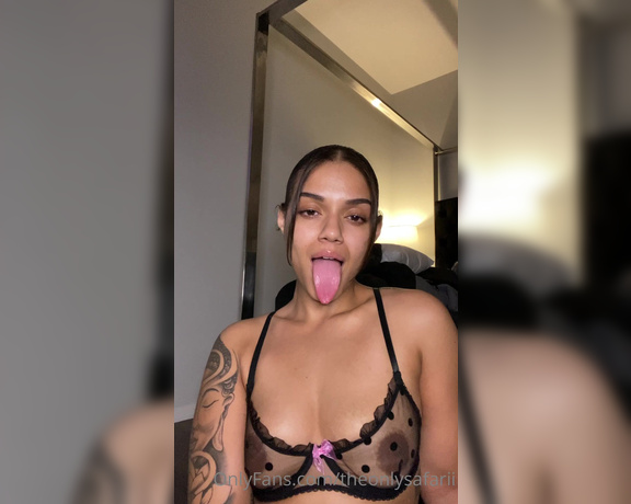 Theonlysafarii aka theonlysafarii OnlyFans - My tongues long huh Imagine wrapped around your balls while I stroke your dick