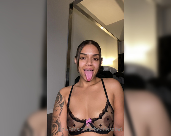 Theonlysafarii aka theonlysafarii OnlyFans - My tongues long huh Imagine wrapped around your balls while I stroke your dick
